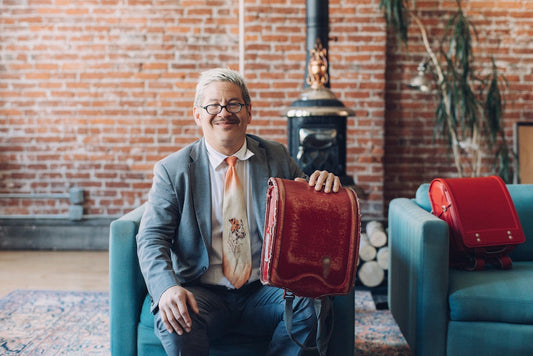 Pink Martini bandleader Thomas Lauderdale with his Randoseru for 17 years