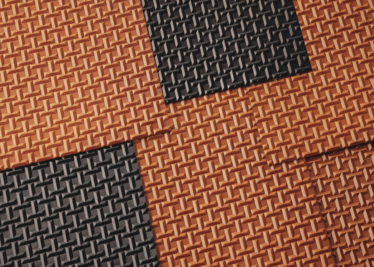 Image showing a spread of the brown and black TSUCHIYA Legacy Logo leather.