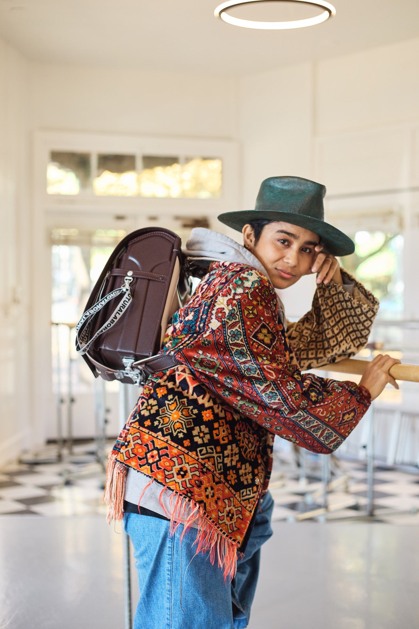 A lady carrying Tsuchiya Kaban's Brown Randoseru