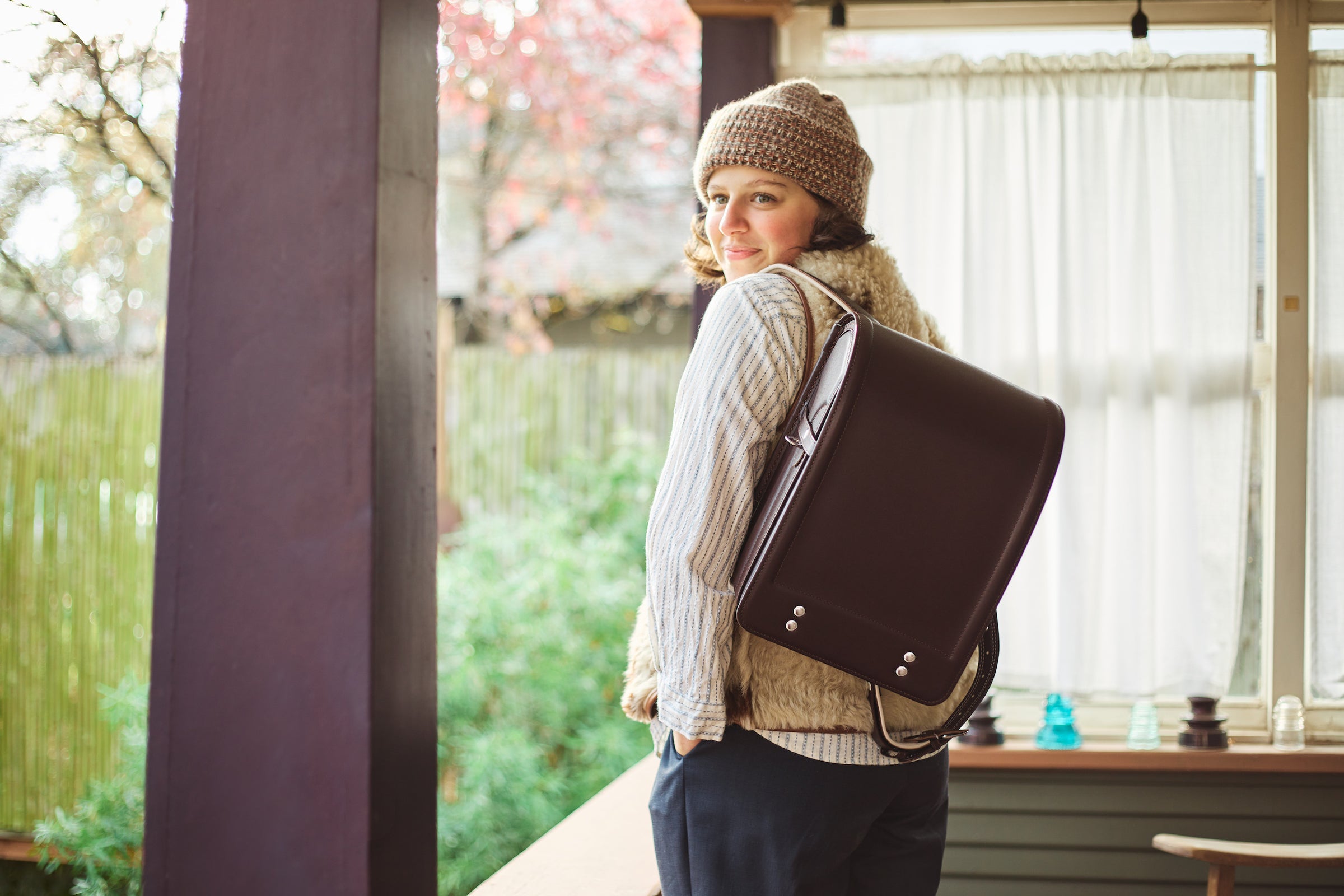 Tsuchiya Kaban’s ambassador Megan Ladd wearing her Tsuchiya Kaban Randoseru in Brown