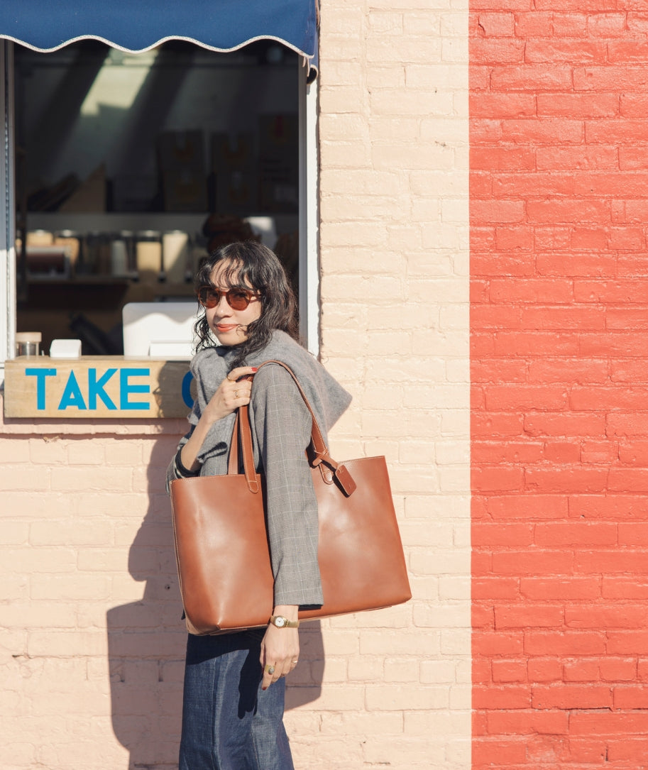 Styling with The Diario Collection / A Woman Carrying Her Favorite Tsuchiya Kaban's Leather Tote Bag Diario Large Tote made in Japan
